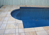 TEAK TILES AROUND POOL