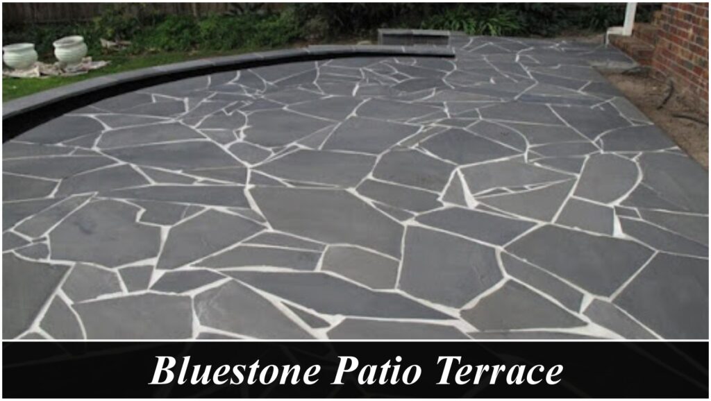 Shows a full entertaining area in bluestone crazy paving